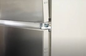 Перенавешивание двери в холодильниках Miele