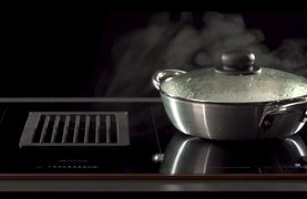 Индукционная варочная панель со встроенной вытяжкой Smeg